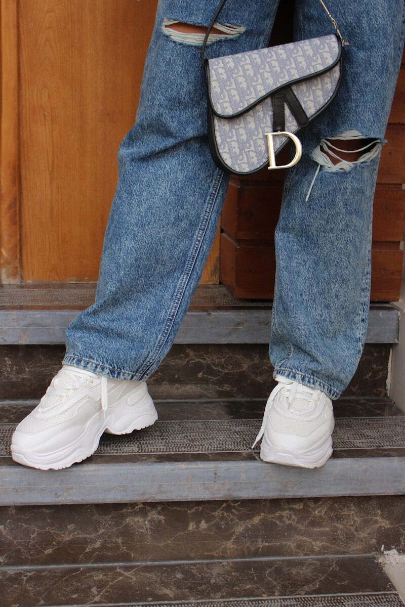 a person's legs and shoes